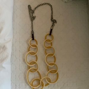 Long lucite necklace cream colors